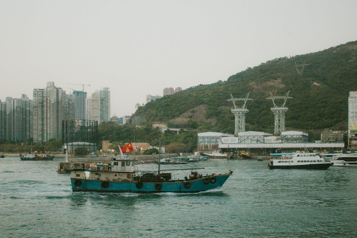 Cargo containers at a busy Asian port