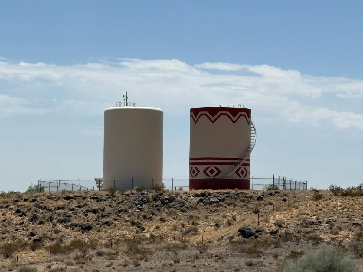 Water collection tank in arid region