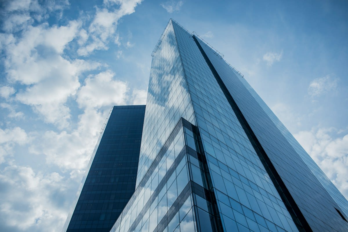 modern skyscraper glass facade reflection