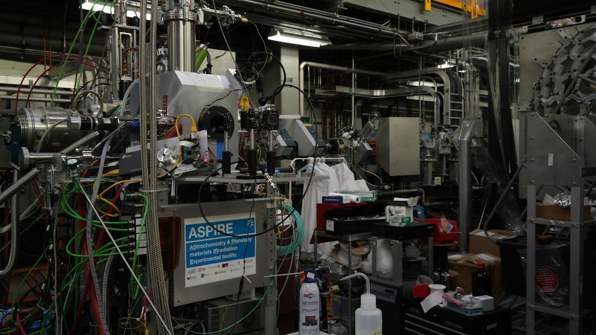 Laboratory technician analyzing CSF samples in a high-tech facility