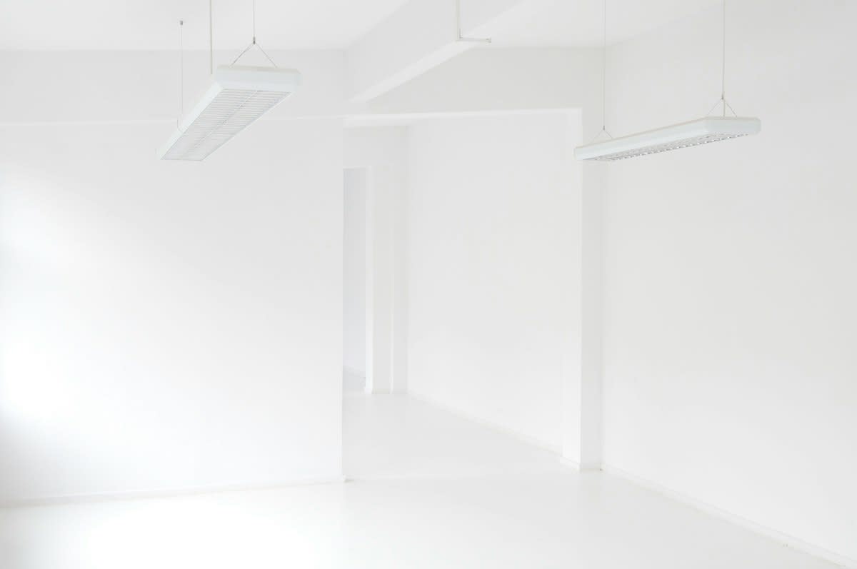 Minimalist white art gallery interior