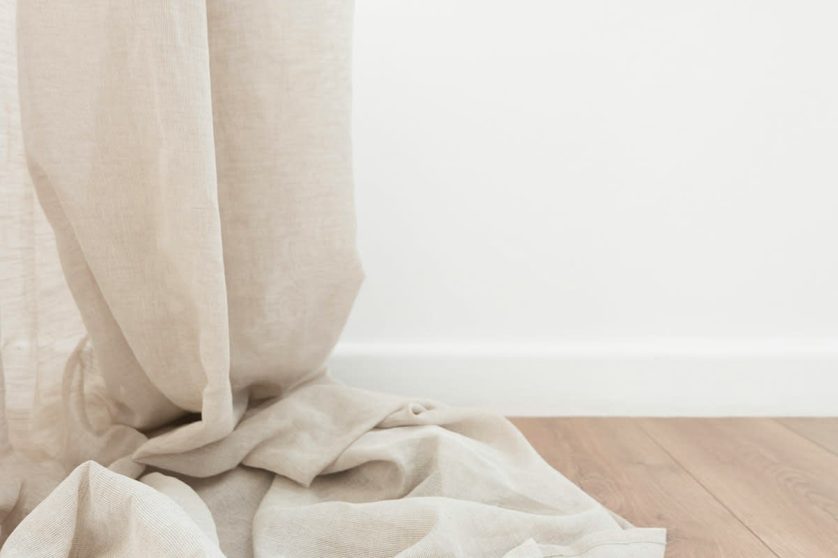 minimalist architectural detail raw concrete and linen