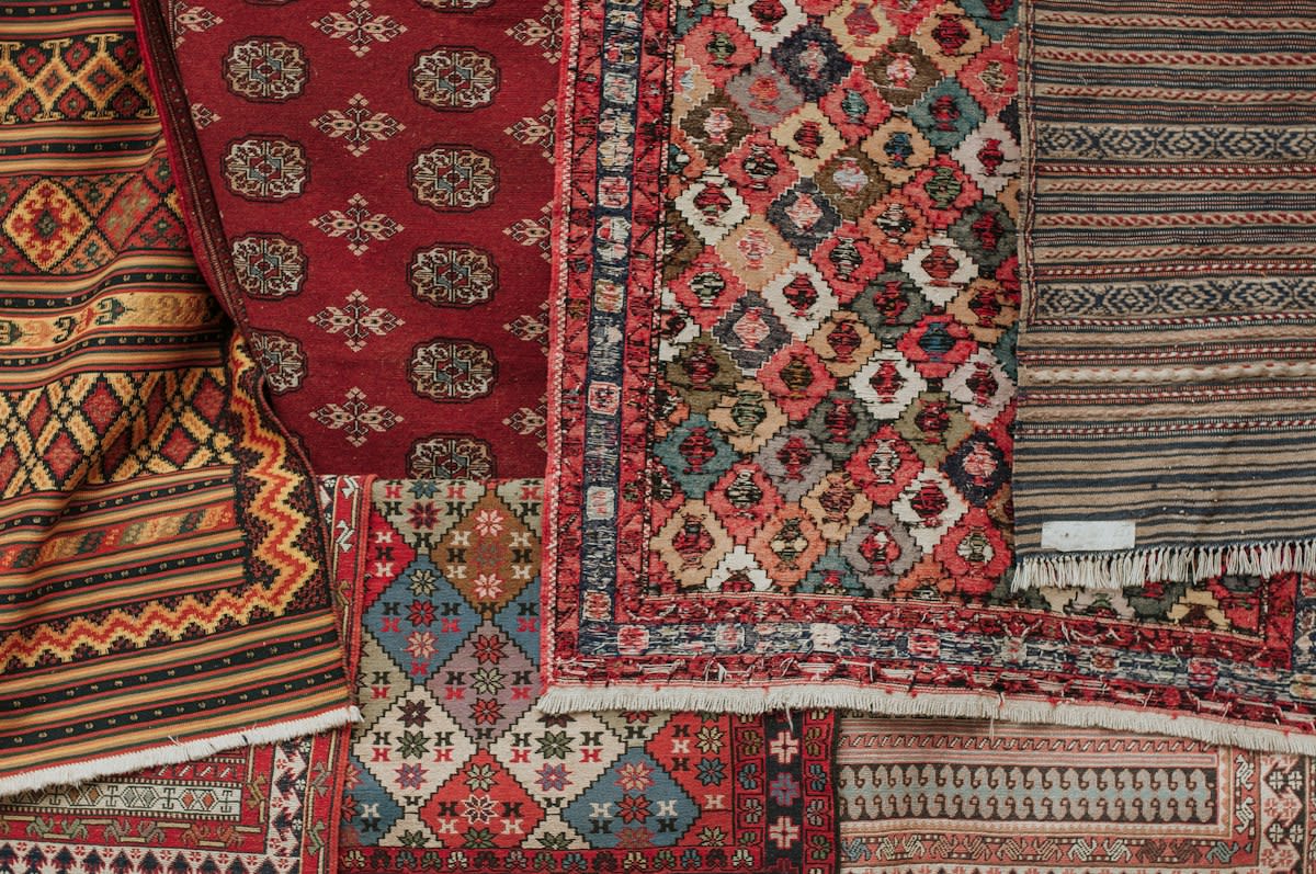 Detailed close up of a traditional Kurdish rug with geometric patterns