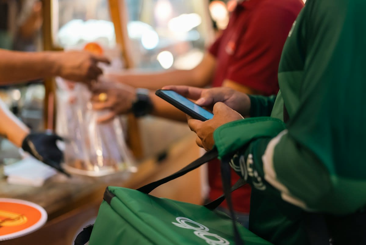 QR code payment at a street market in Southeast Asia
