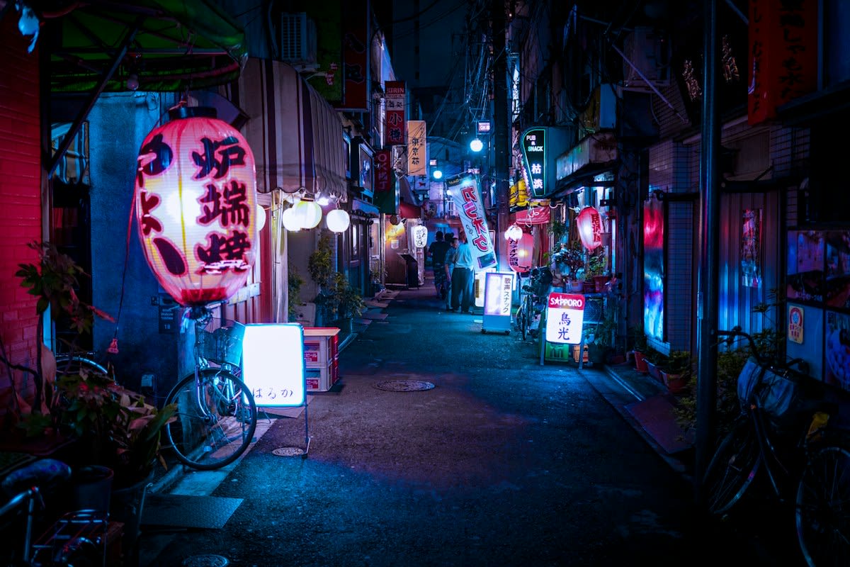 Overlapping neon signs in a dense Asian city