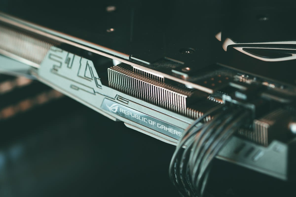Close up of a high-end GPU circuit board with dust and heat stains