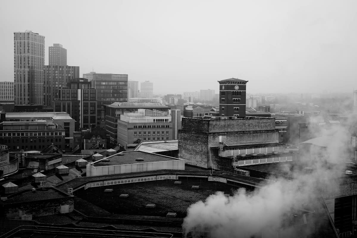 Industrial rooftop in a smoggy city
