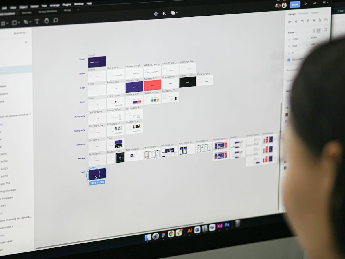 Close up of a computer screen with code and spreadsheets