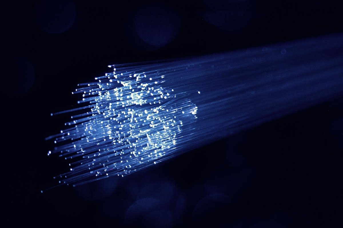 Close up of fiber optic cables glowing