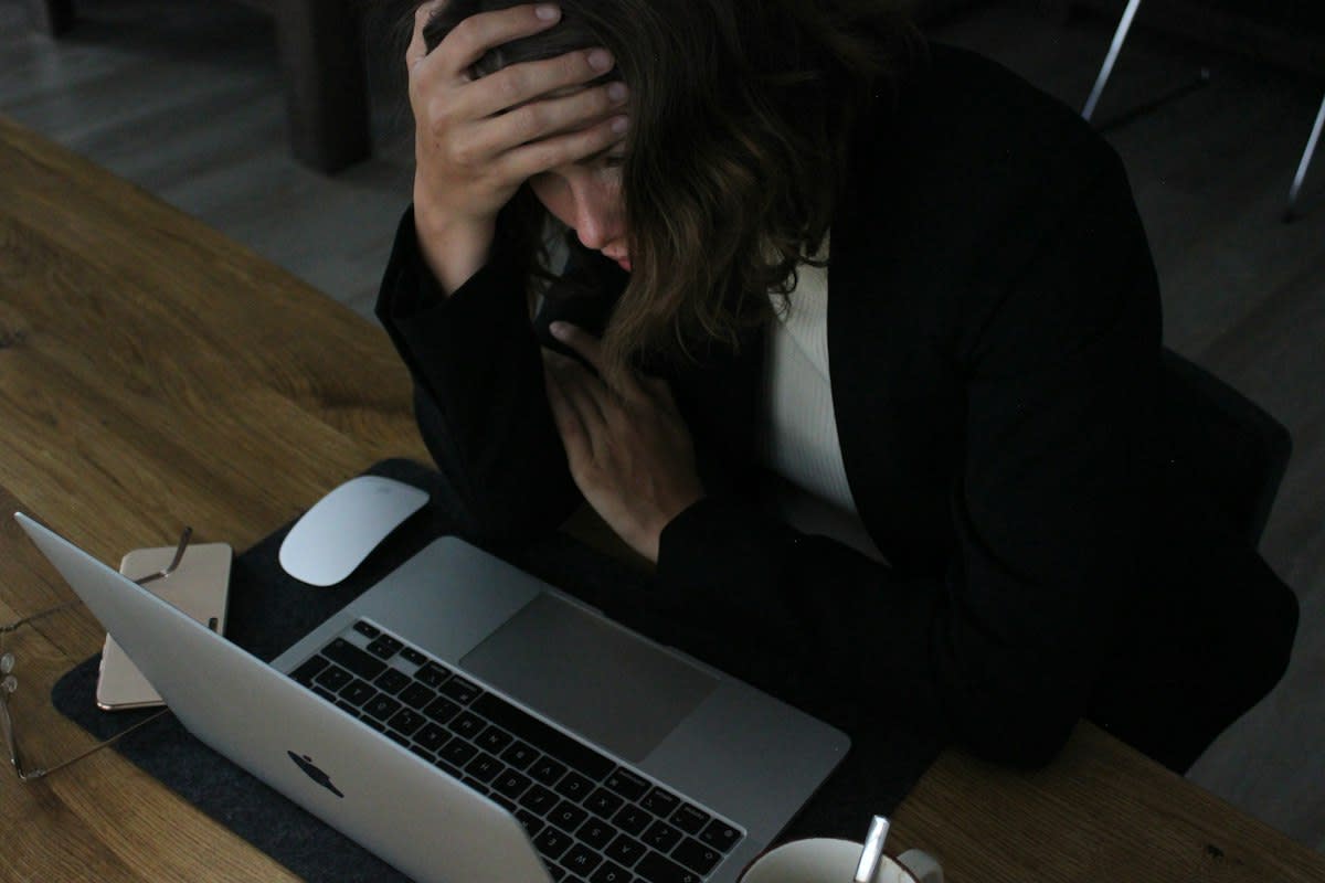 Office worker stressed at night
