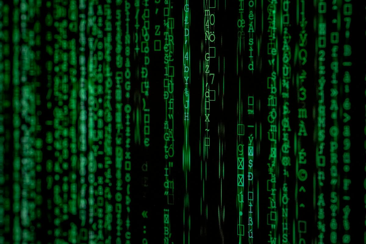 Digital data streams over a dark background
