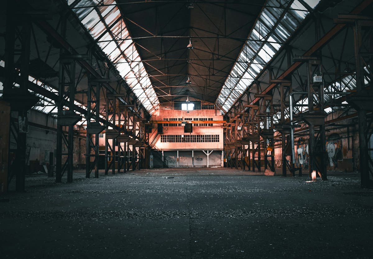 Rusty industrial machinery in a warehouse