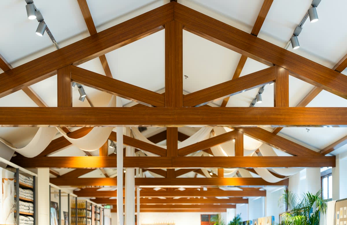 charred building interior with exposed beams