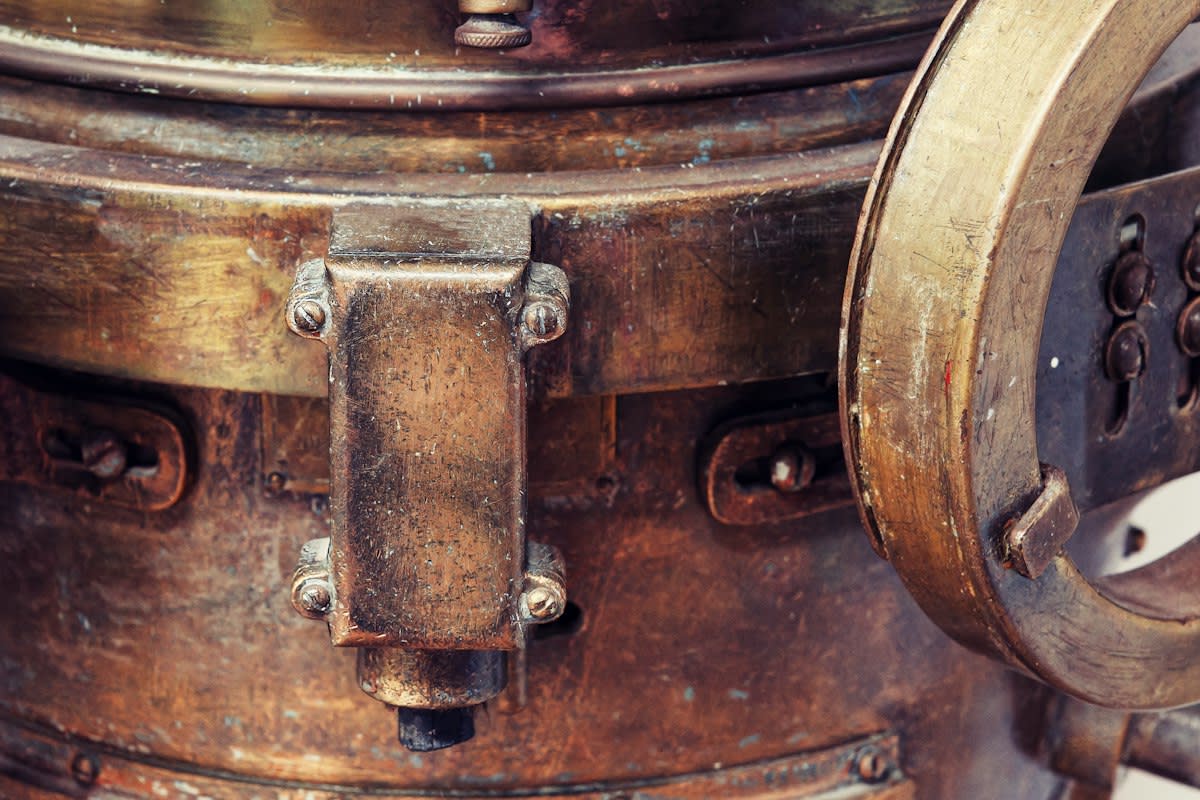 Close up of an old coffee machine with rust and stains