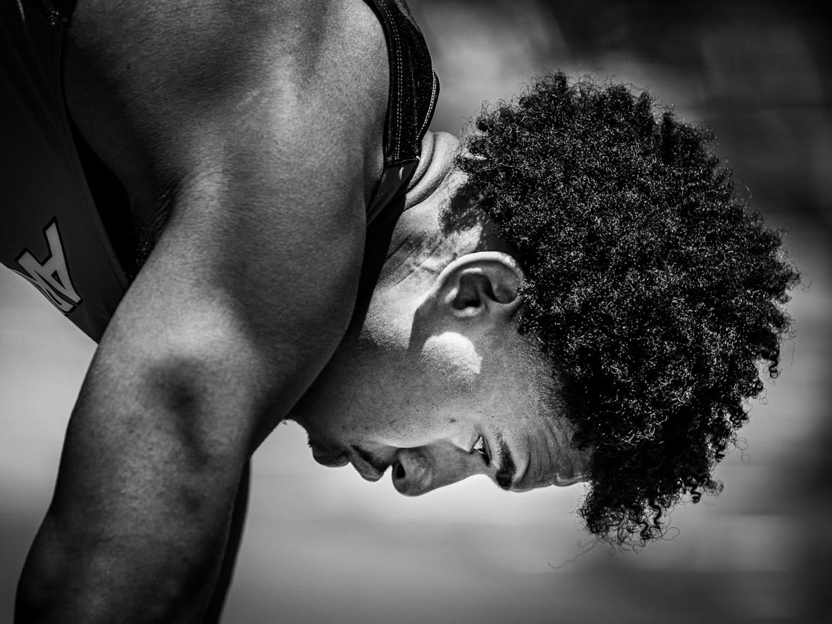 Close up of an athlete's strained face
