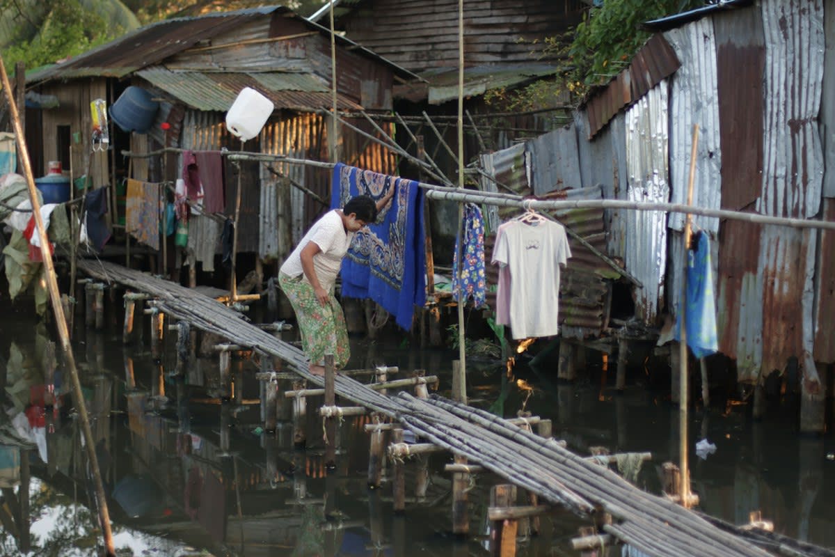 Flooded streets in a dense urban slum