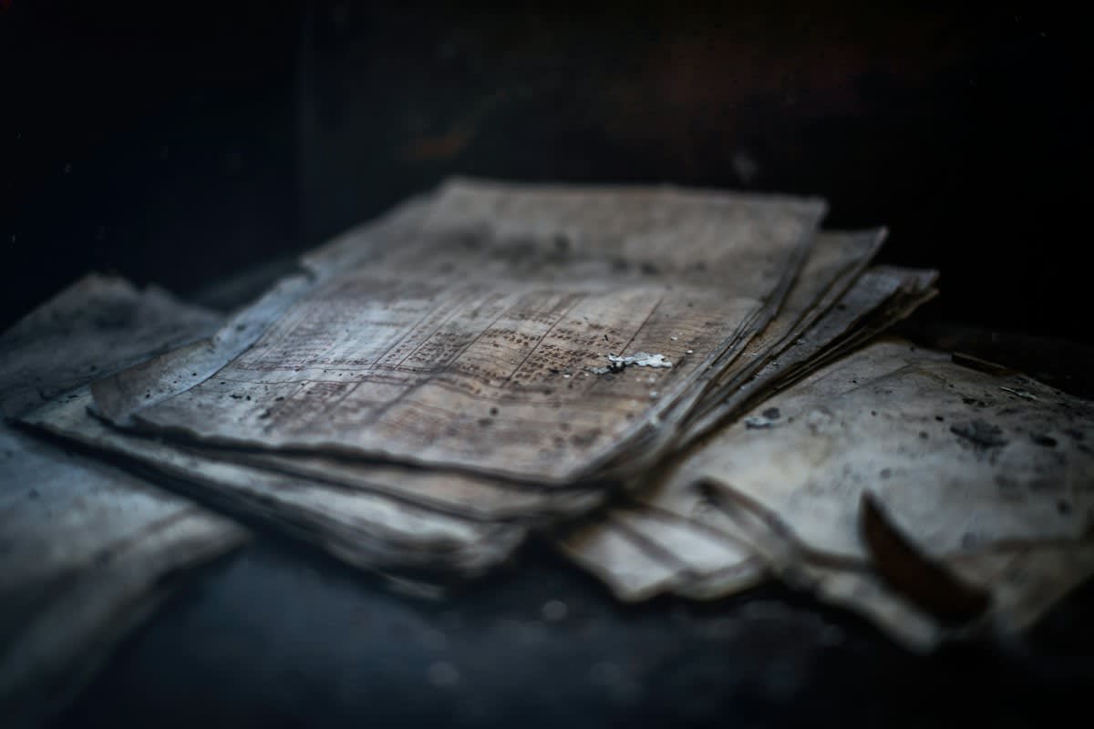 close up of old printing press ink and paper