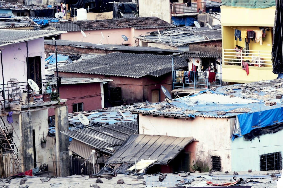 crowded urban slum with tangled electrical wires