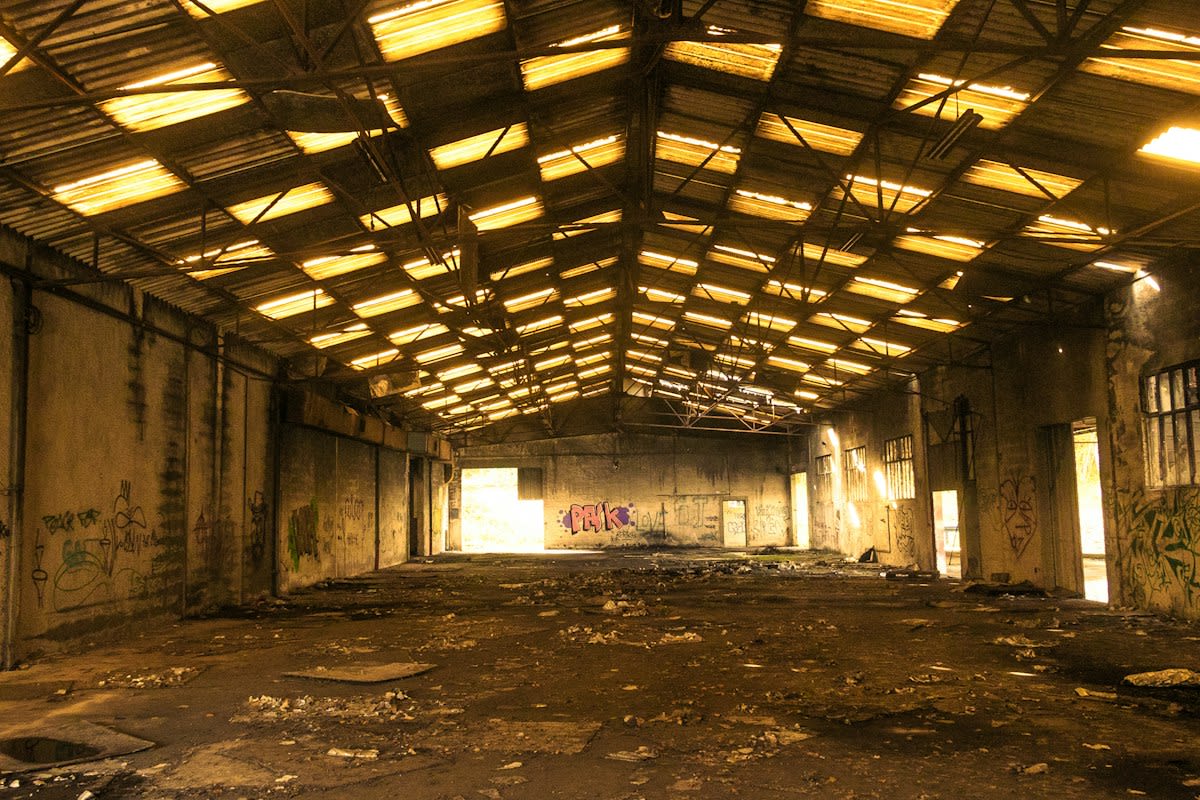 industrial warehouse interior with peeling paint