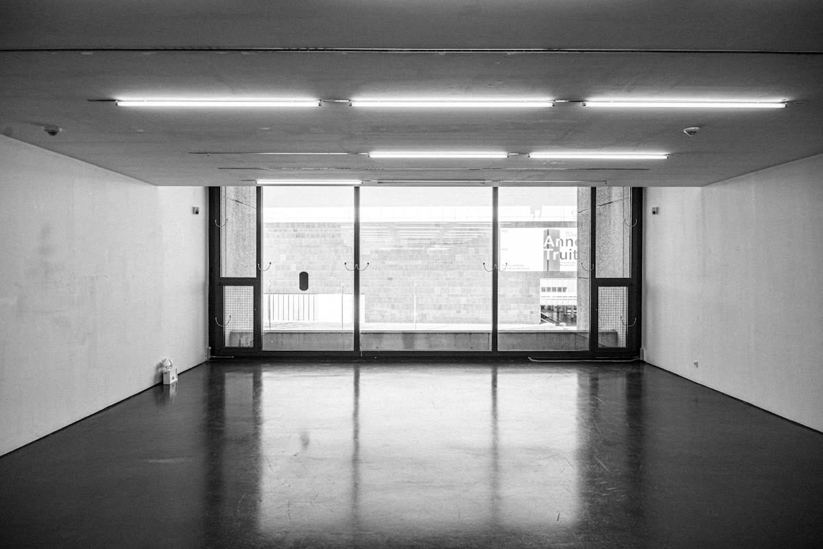 empty art gallery with fluorescent lights