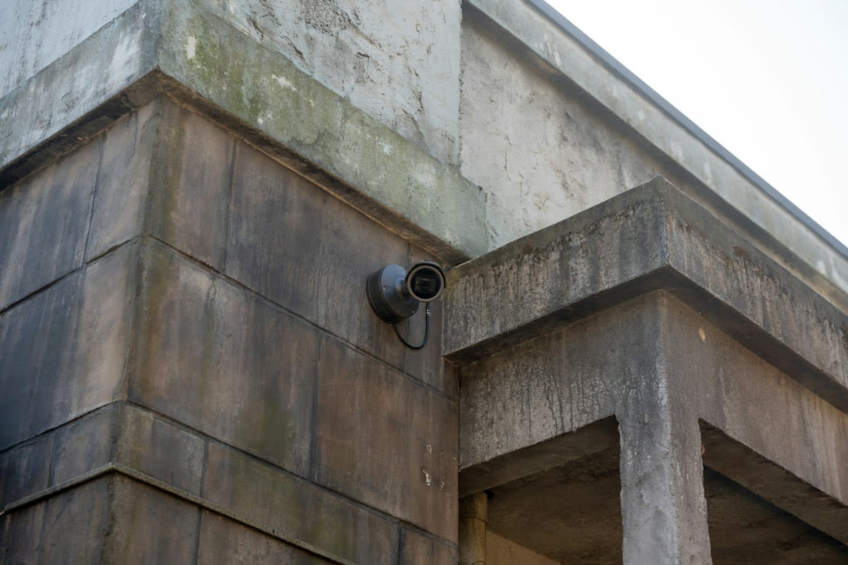 security camera on concrete wall