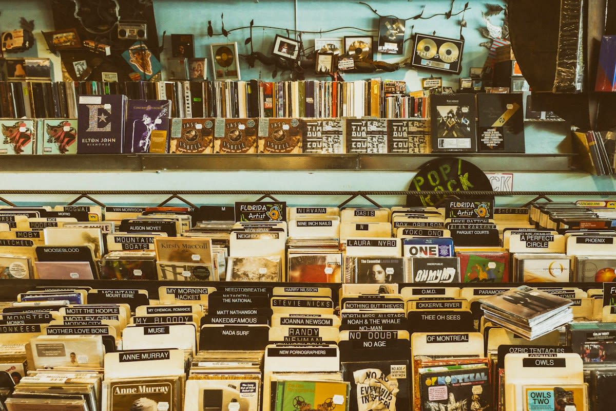 A record store interior with rows of vinyl