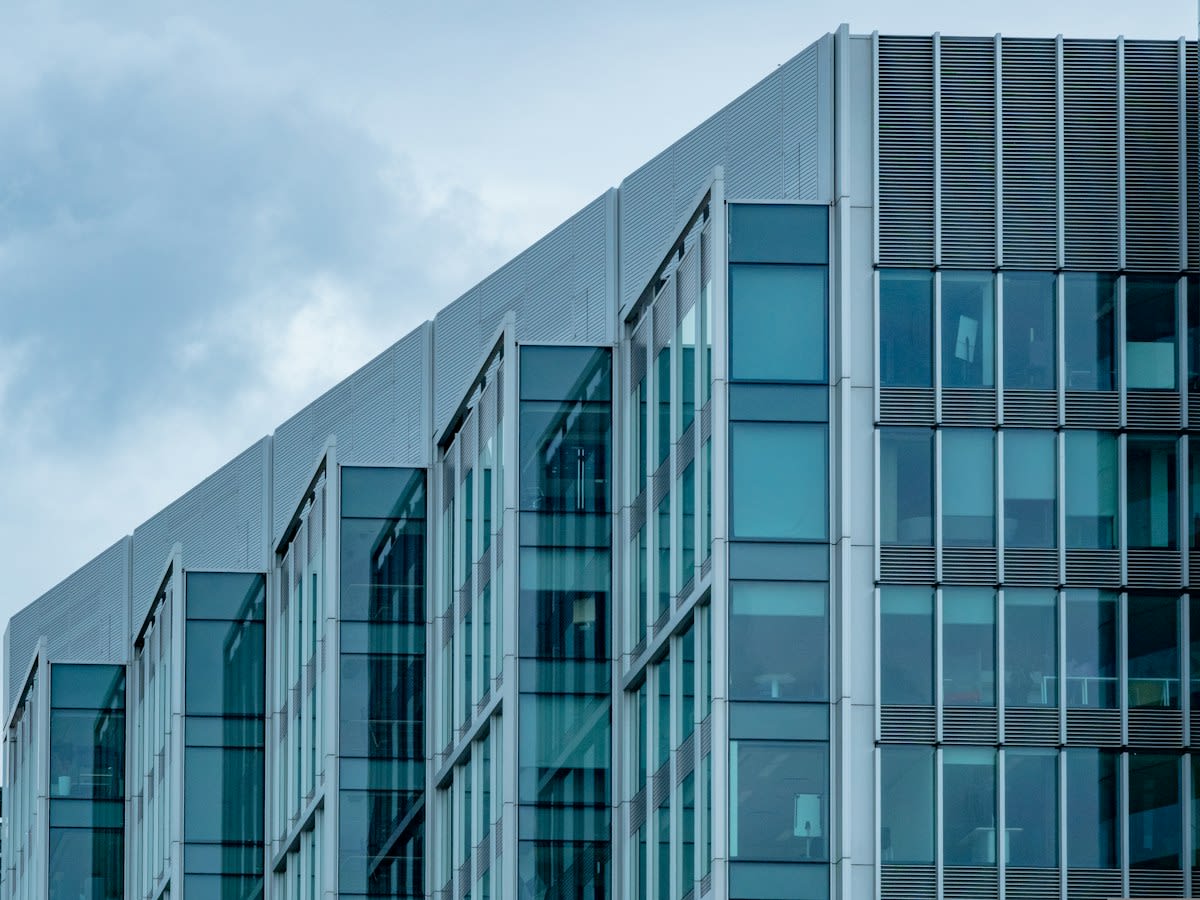 modern corporate office building glass facade