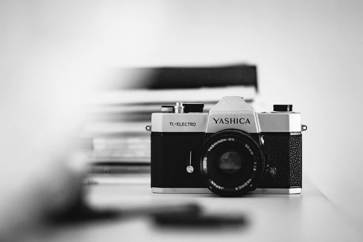 vintage analog camera and oxidized gear