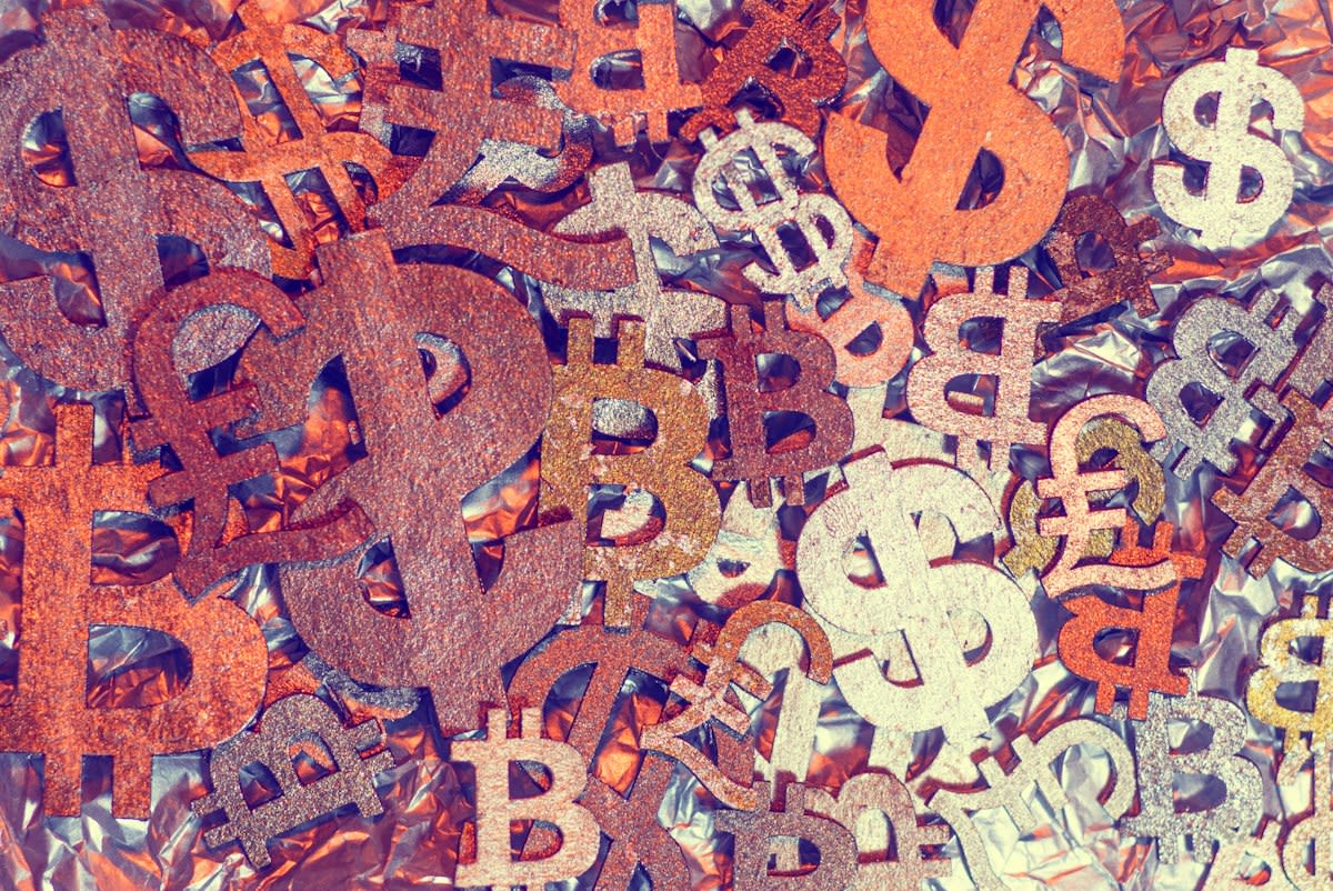 Close up of digital currency symbols on a screen