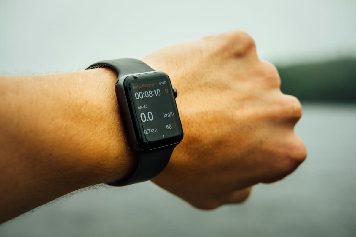 Athlete wearing a fitness tracker on wrist