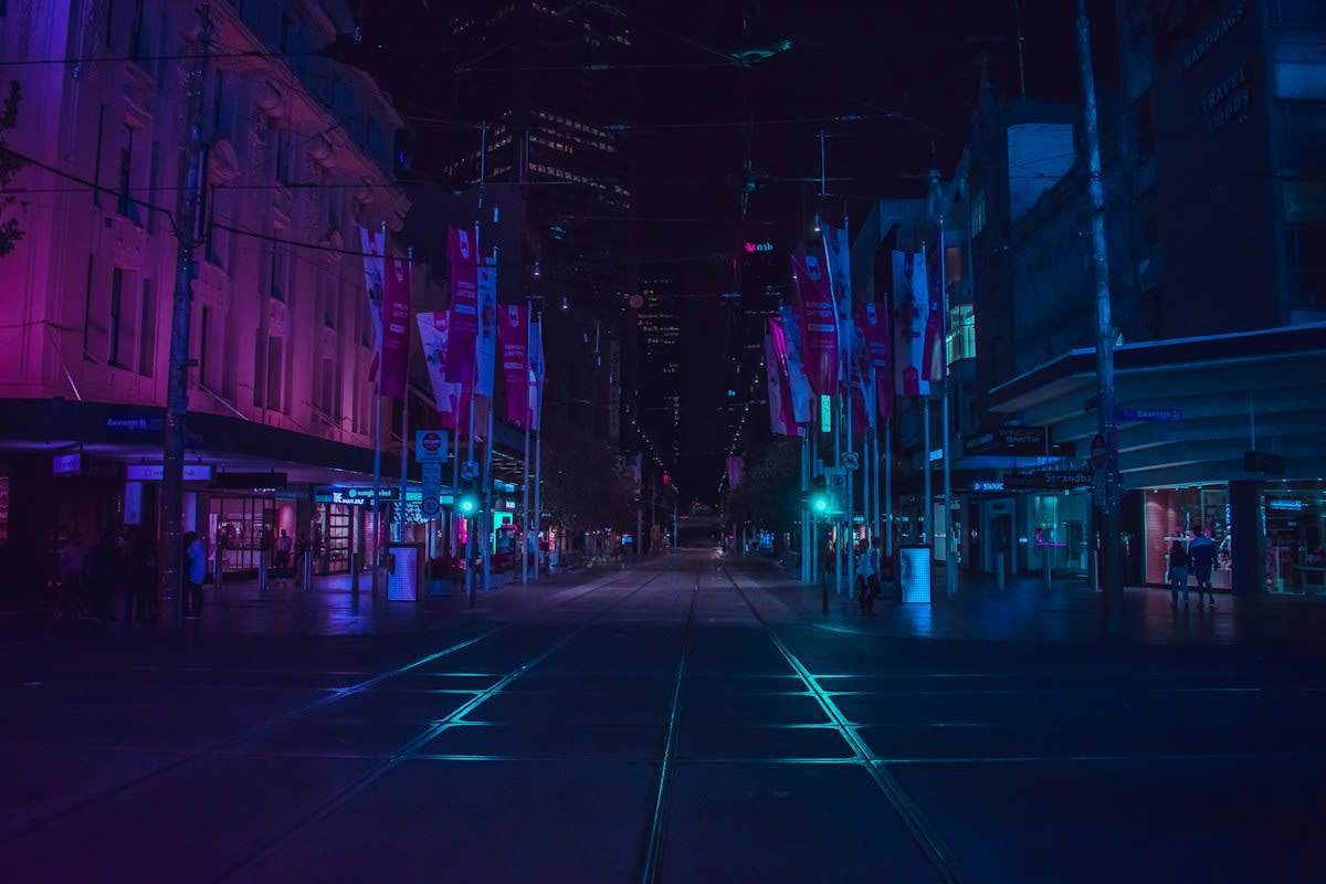 Neon city lights blurred