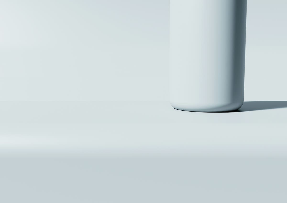 Minimalist luxury spirit bottle on a white background