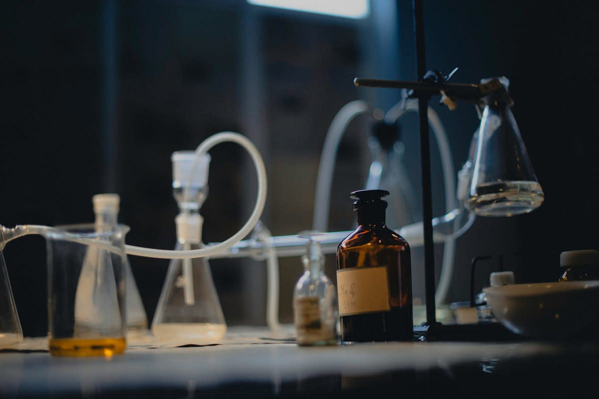 laboratory glassware with chemical reactions
