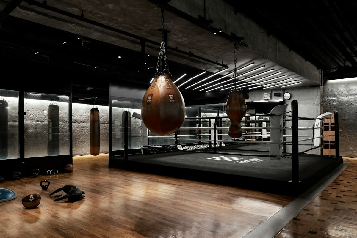Boxing gym interior with heavy bags