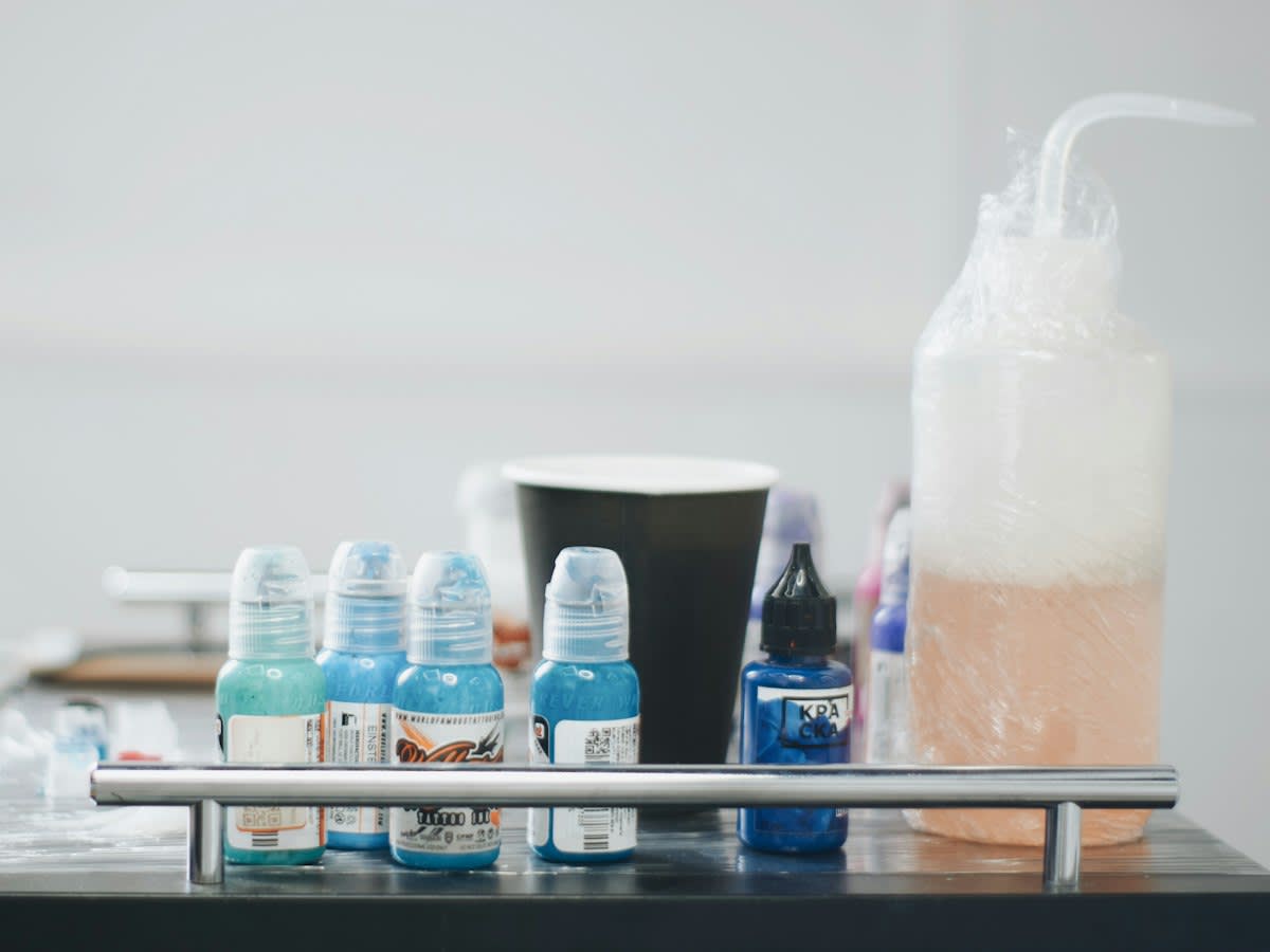 Professional tattoo equipment and ink bottles