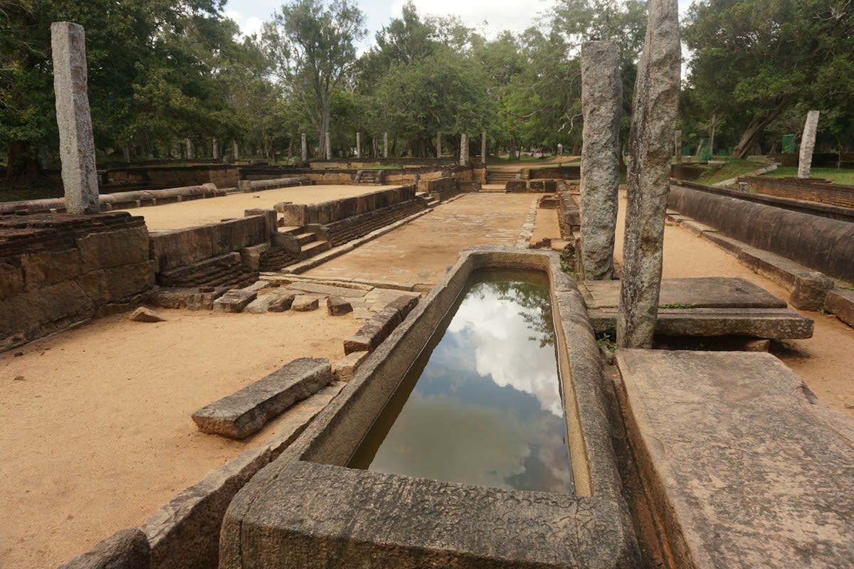 Ancient water temple basin with irrigation channels