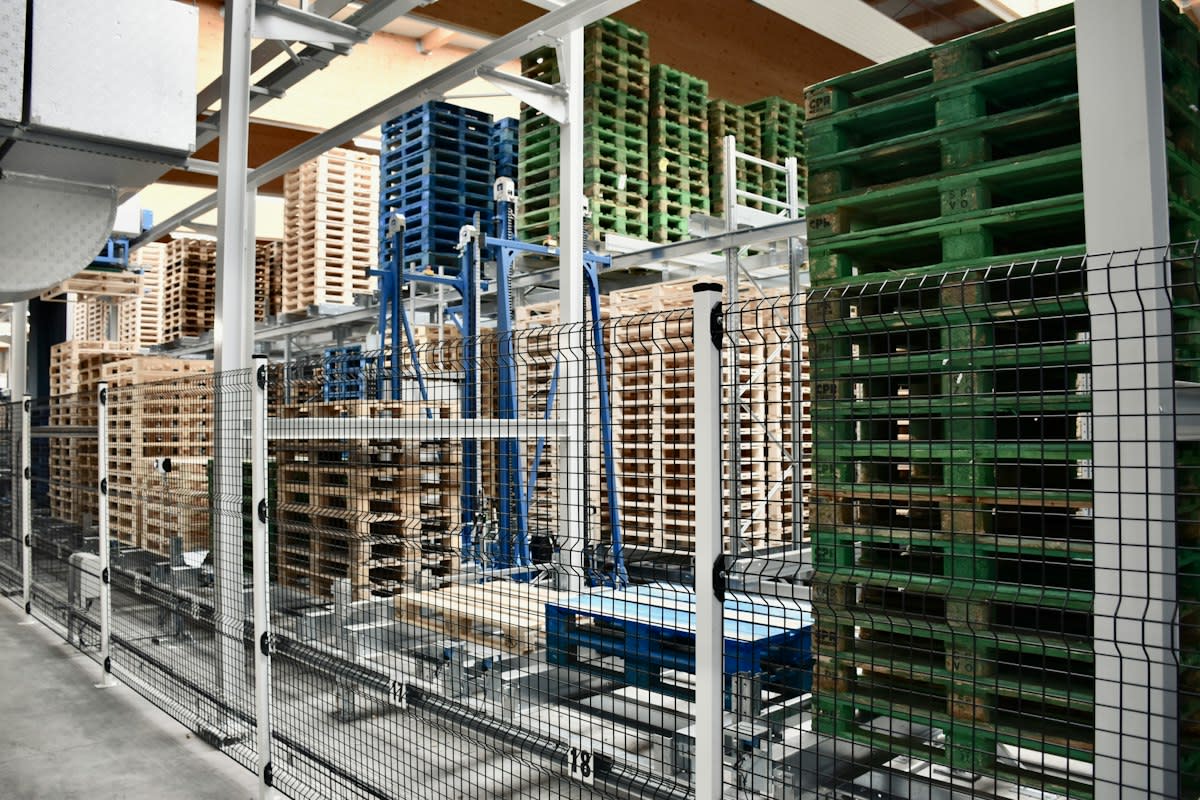 Modern logistics warehouse with digital screens