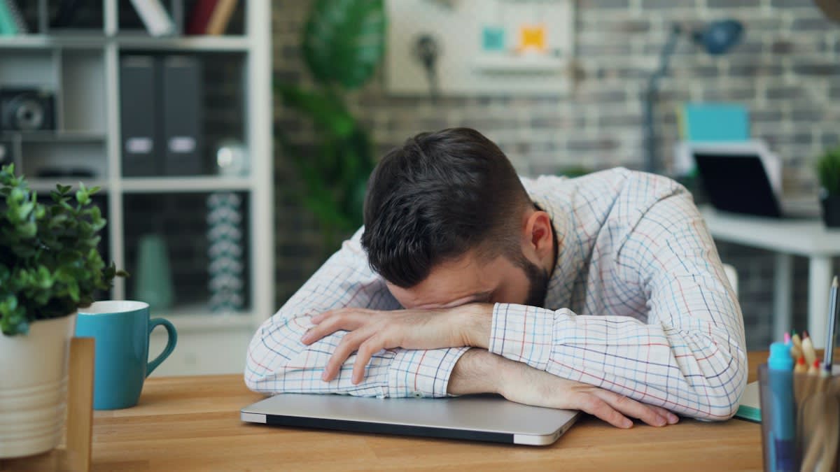 stressed professional at desk