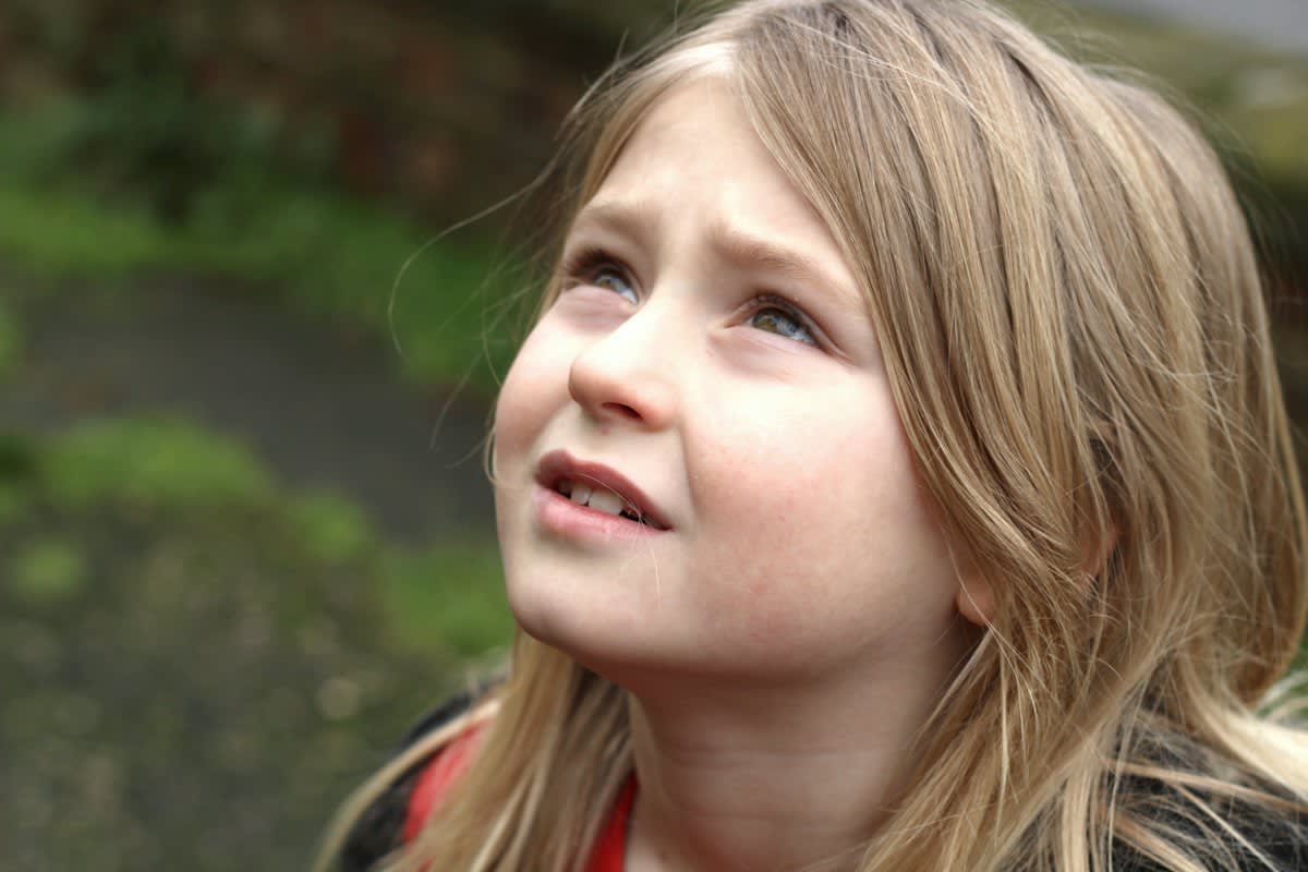 child breathing deeply