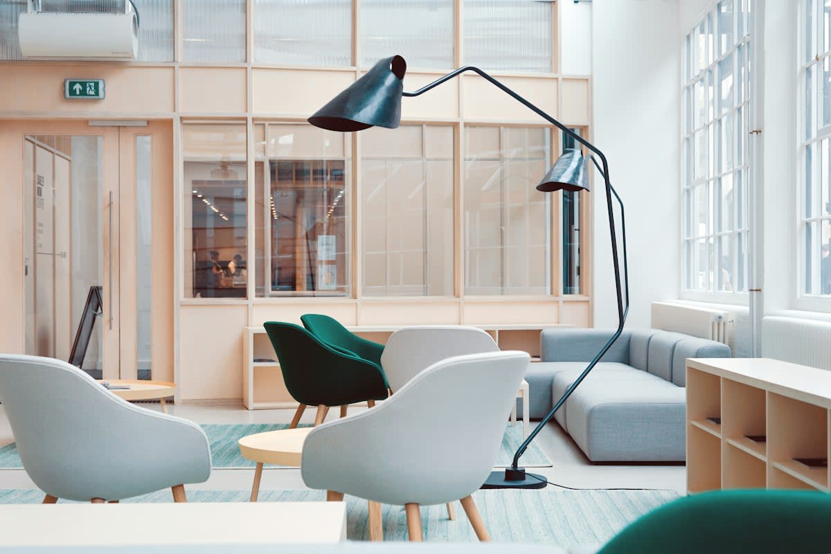 Modern minimalist office with acoustic panels and soft lighting