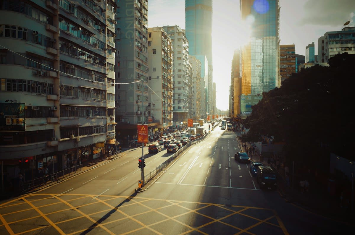 Person meditating in a busy city