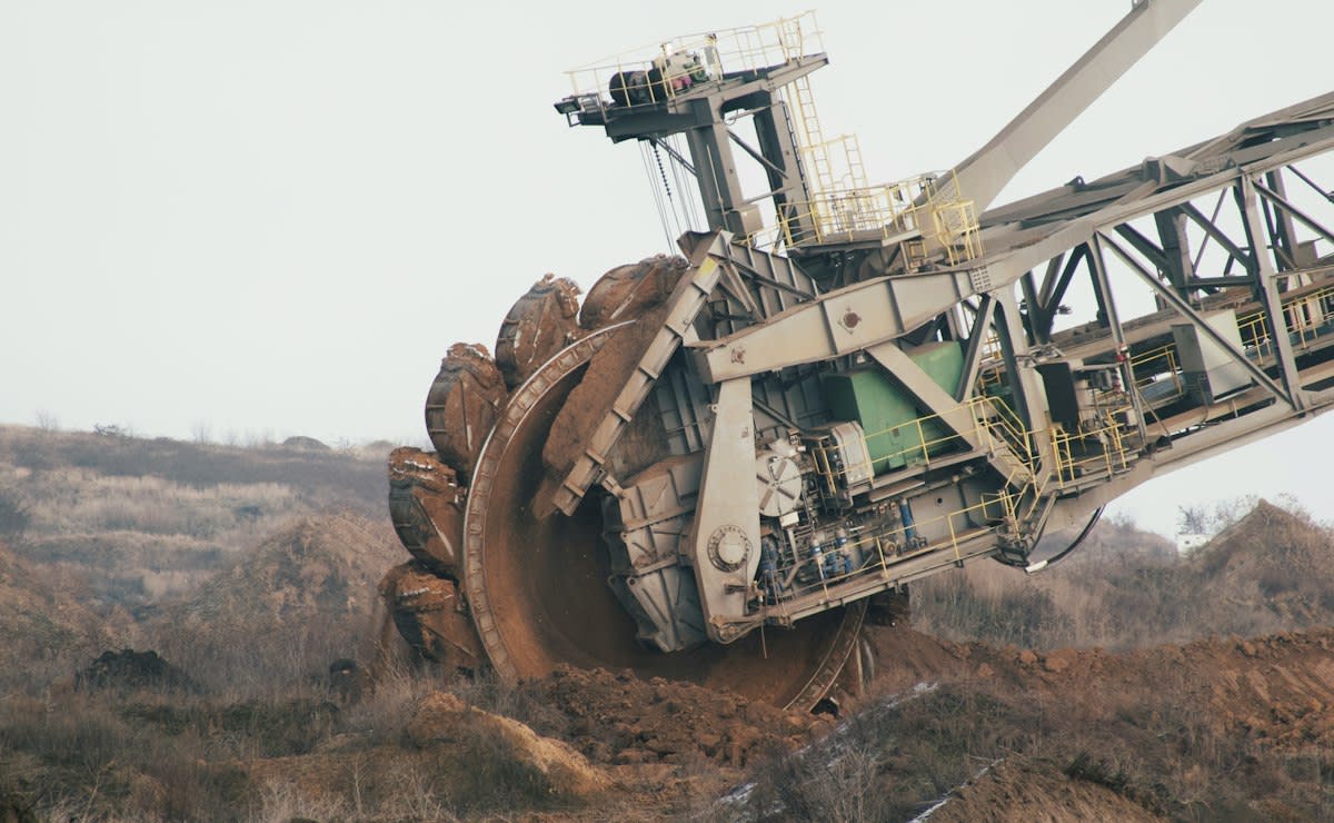 Industrial mining site with digital tablet