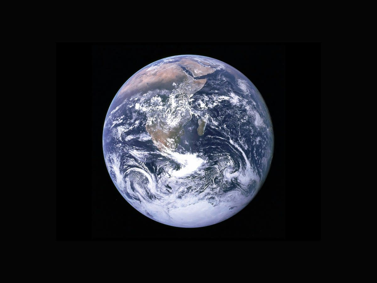 Satellite view of earth with orbital debris lines