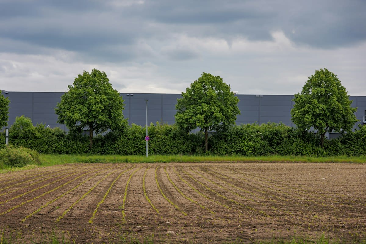 Modern warehouse in a rural landscape