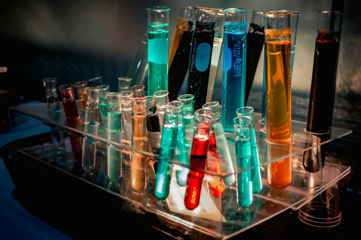 Laboratory equipment and beakers with colorful liquids