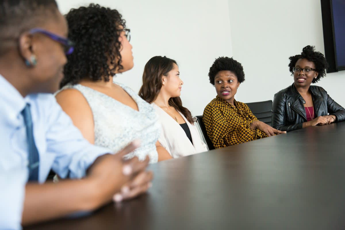 Group of diverse professionals in a deep discussion