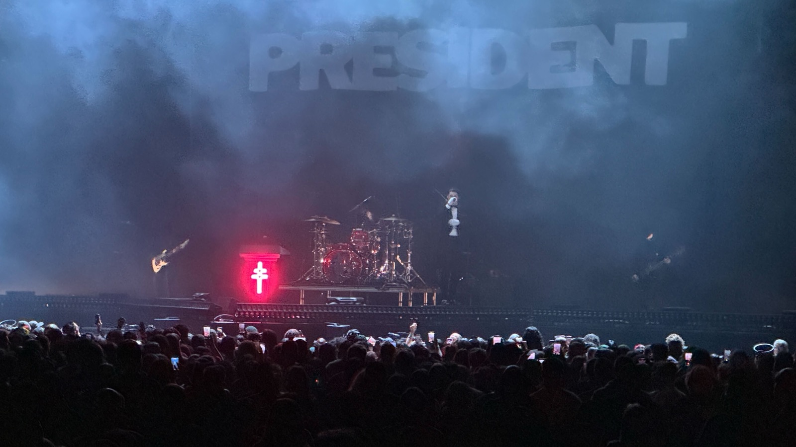 PRESIDENT performing live on stage, masked members in full 2026 tour setup