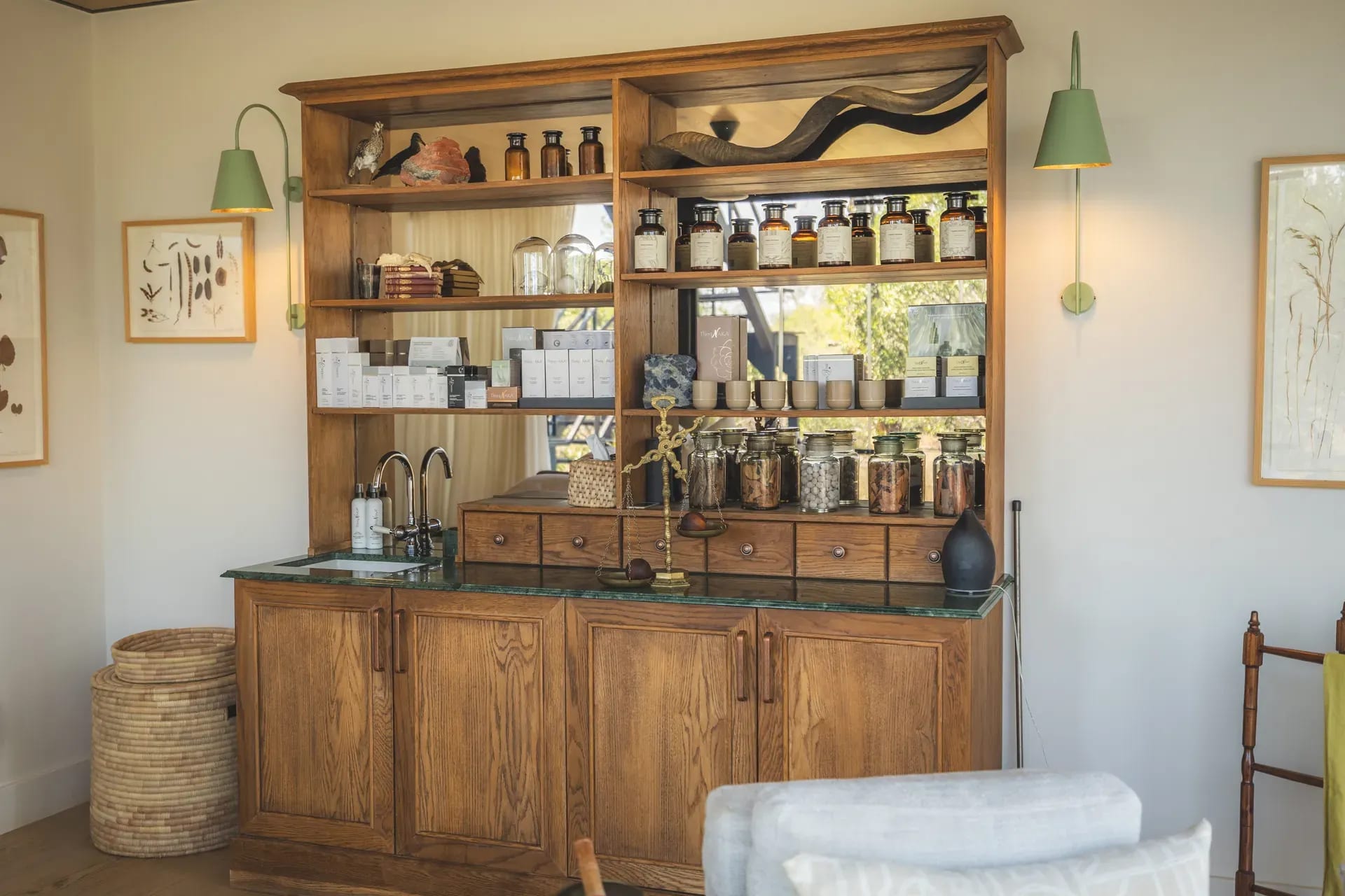 Spa treatment shelf at Monwana displaying an array of wellness products.