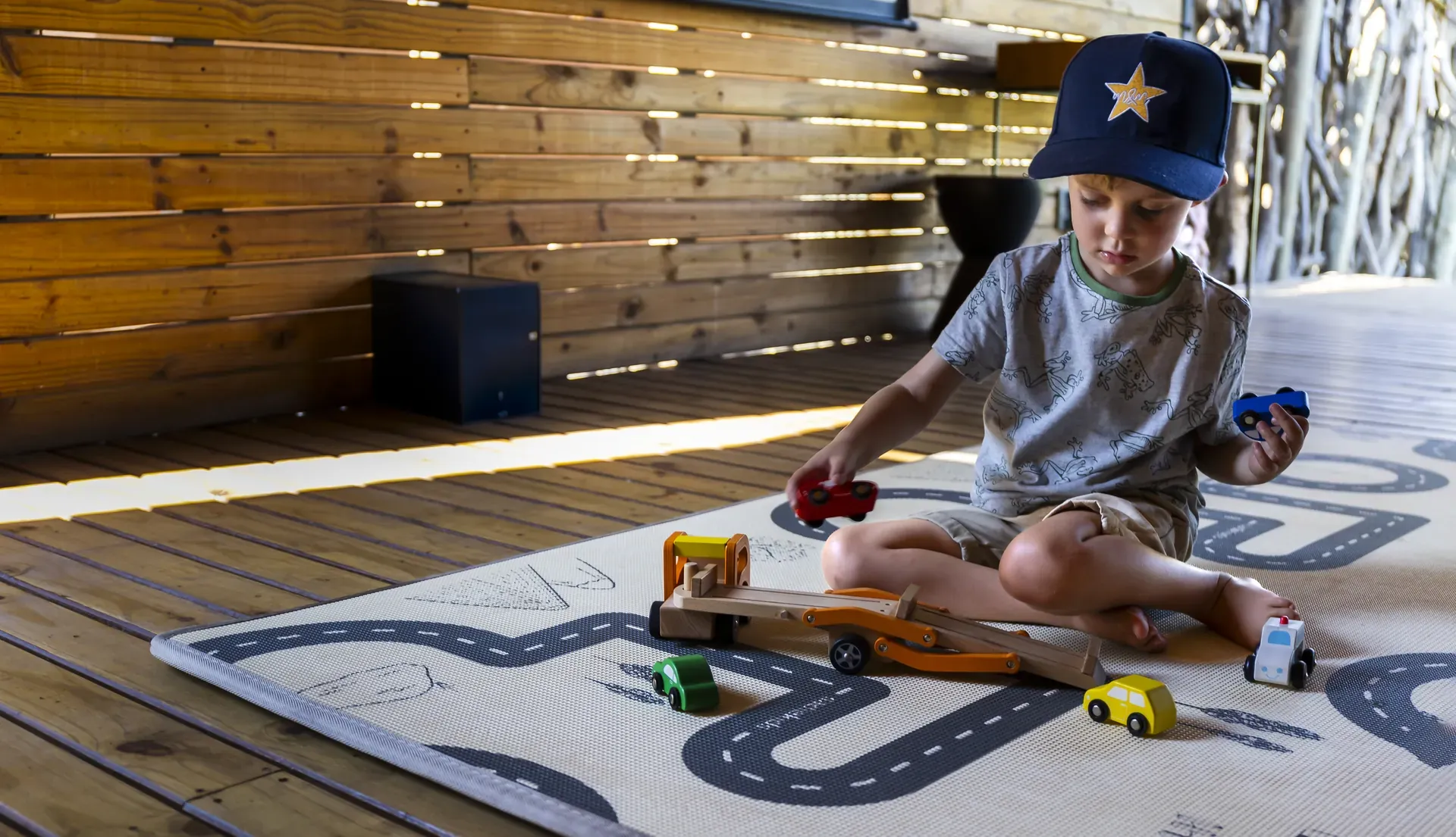 Child playing with educational toys at Marataba’s kids program.