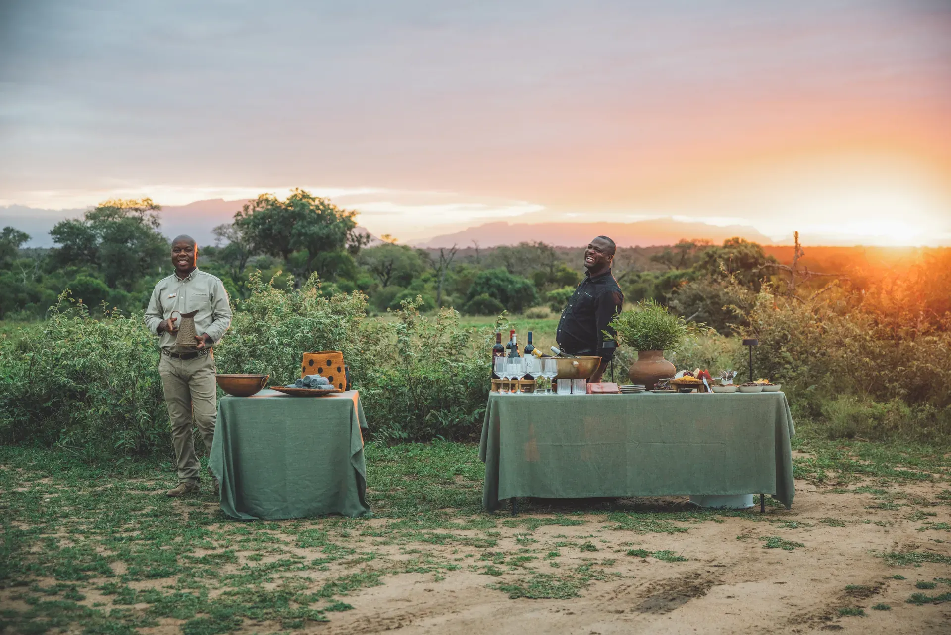 Gin stop experience at Monwana Lodge, with drinks set up in the African bush.
